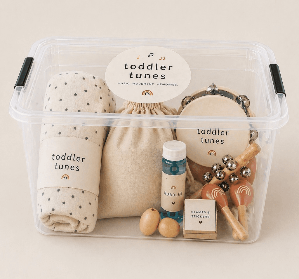 Toddler Tunes Music Box with instruments, sensory items, and class materials